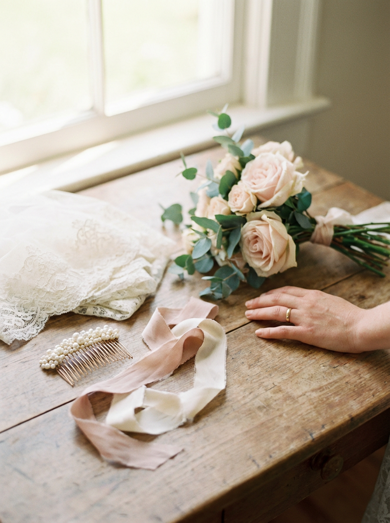 Firefly_Gemini Flash_Fine-art film bridal detail shot in soft, diffused natural light. Close-up of delicat 561198