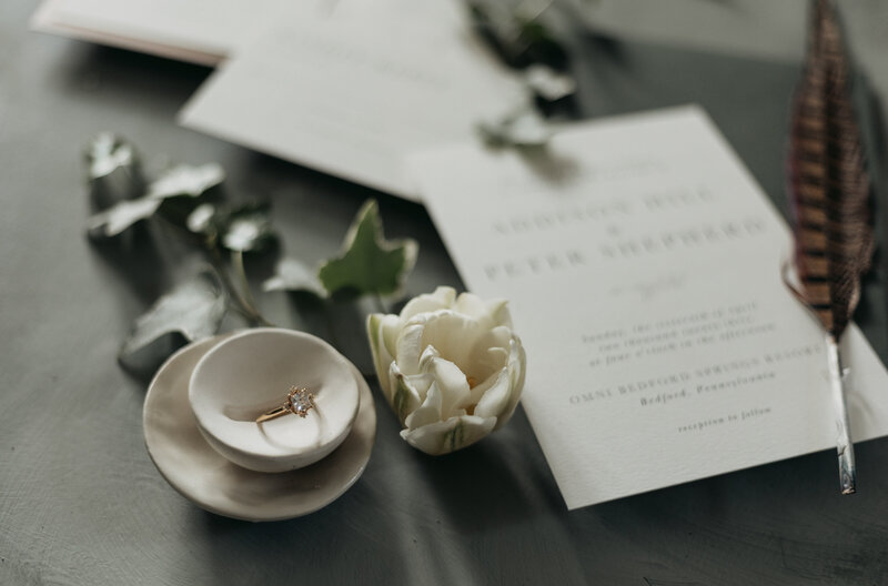 wedding invitation, ring, and florals, capturing romantic wedding details in soft, natural light