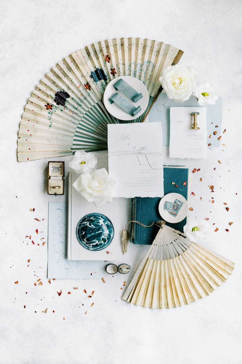 How to style a wedding flat lay, antique fans, hand painted rollable canvas styling mat