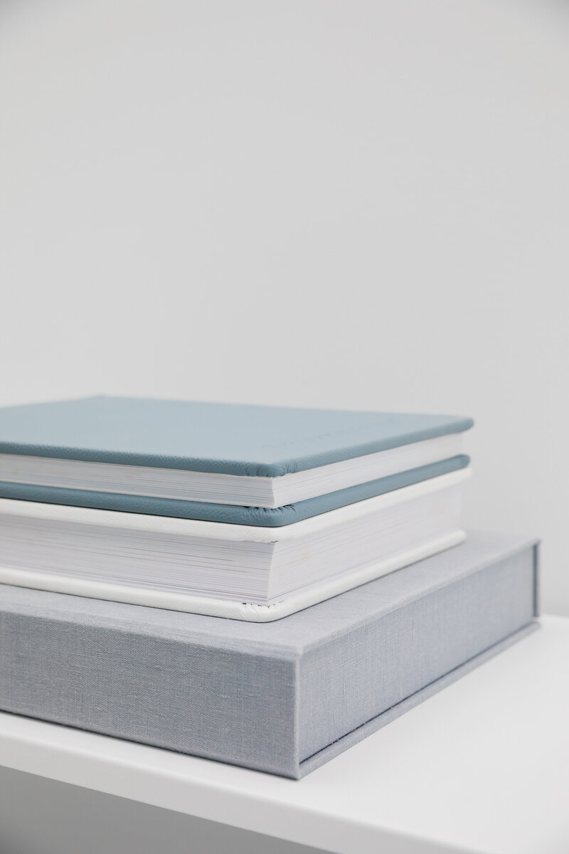 A stack of photo albums
