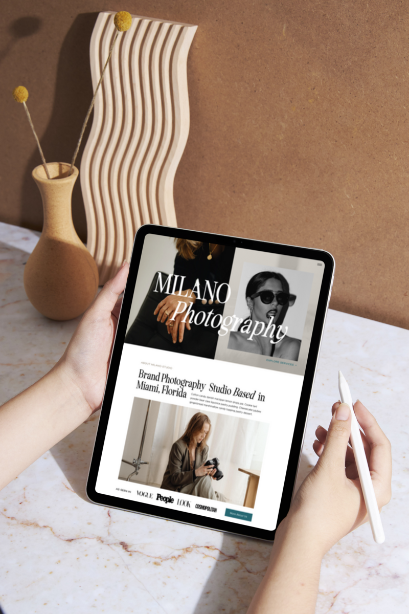 Tablet displaying Milano Photography website homepage featuring minimal luxury design with editorial fashion imagery and studio information