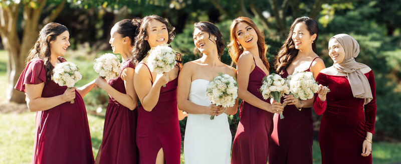 Bridesmaids laughing with Asian bride during summer wedding | Whitehouse Station | New Jersey