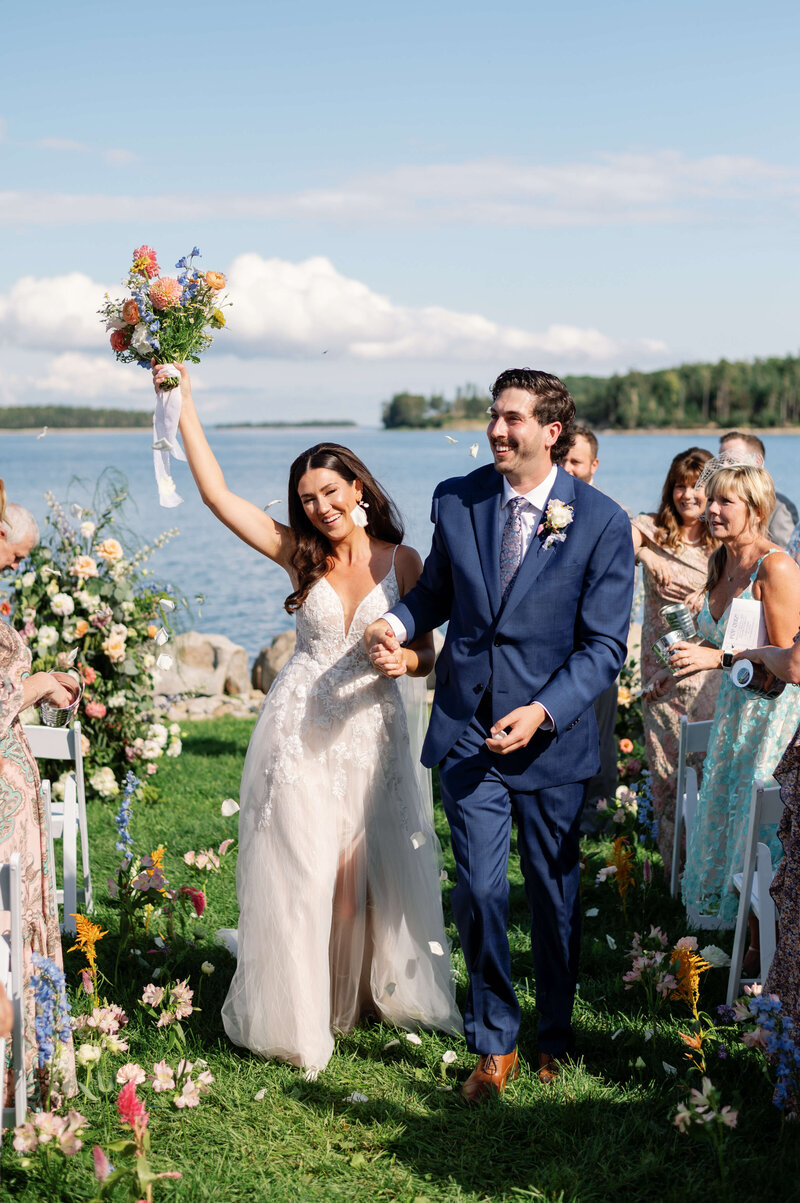 Couple just married after outdoor wedding ceremony in Halifax, Nova Scotia