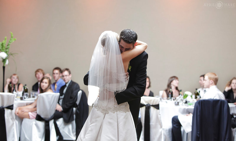 Couple dances first dance at their Curtis Hotel Wedding Reception in Downtown Denver