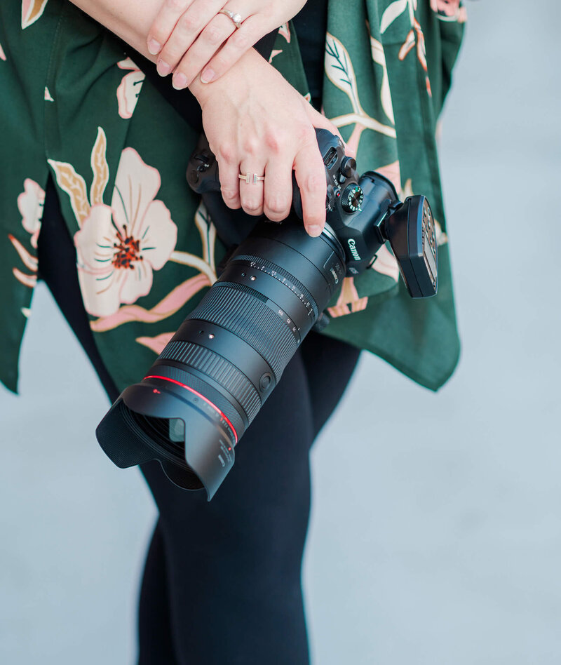 Close up of camera being held by woman during branding session in Utah.