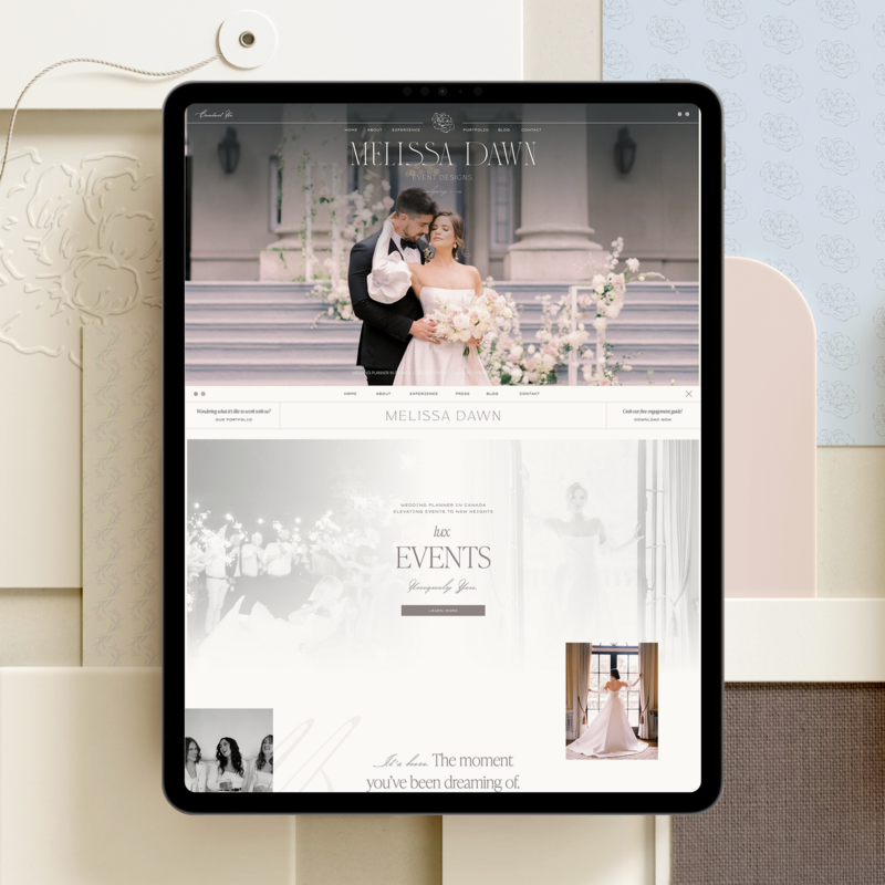 Tablet displaying a custom Showit web design and branding for a wedding photography website, featuring a bride and groom, floral decor, and event details on a neutral and pastel-themed background.