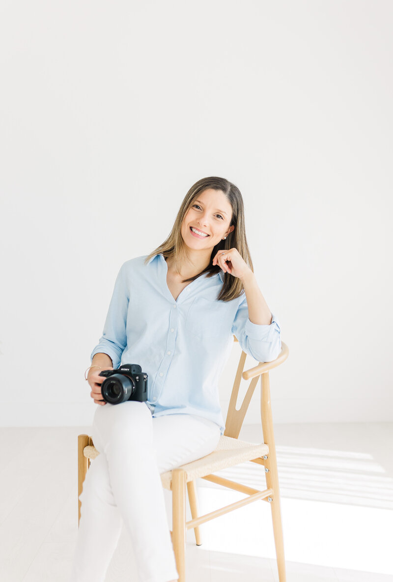 Headshot in a white studio of an Austin Texas Portrait Photographer