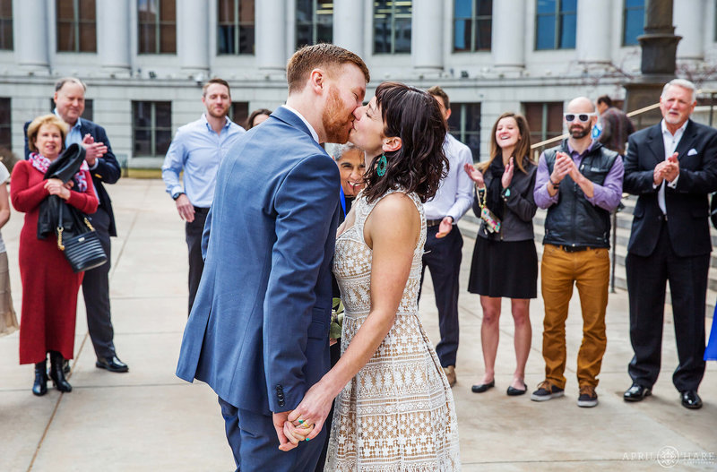 Wedding-Kiss-Ceremony-Photo-at-front-of-Denver-County-Courthouse-Wedding-in-Colorado