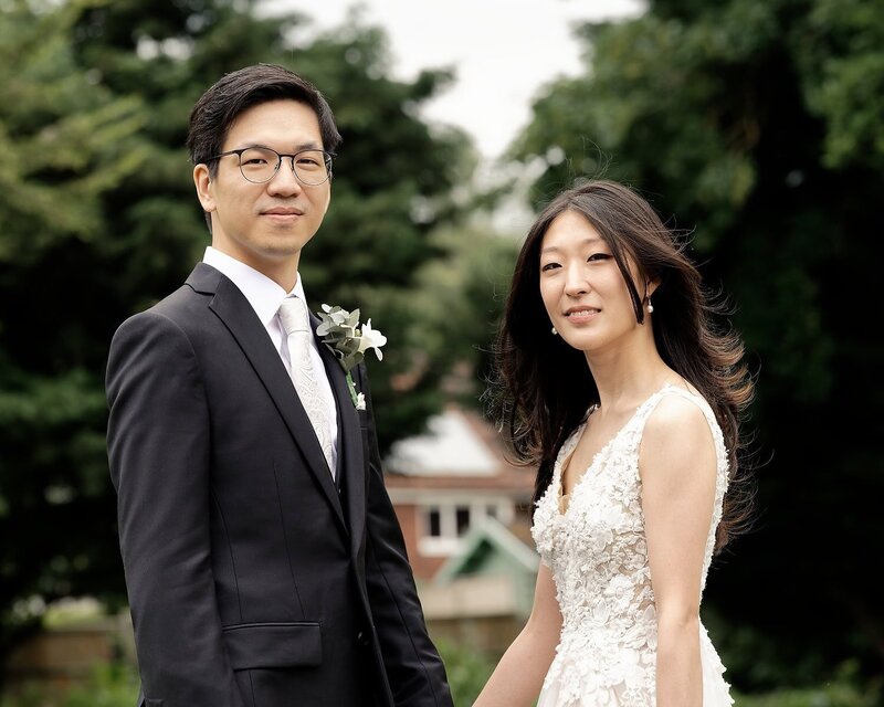 married couple looking at the camera and smiling