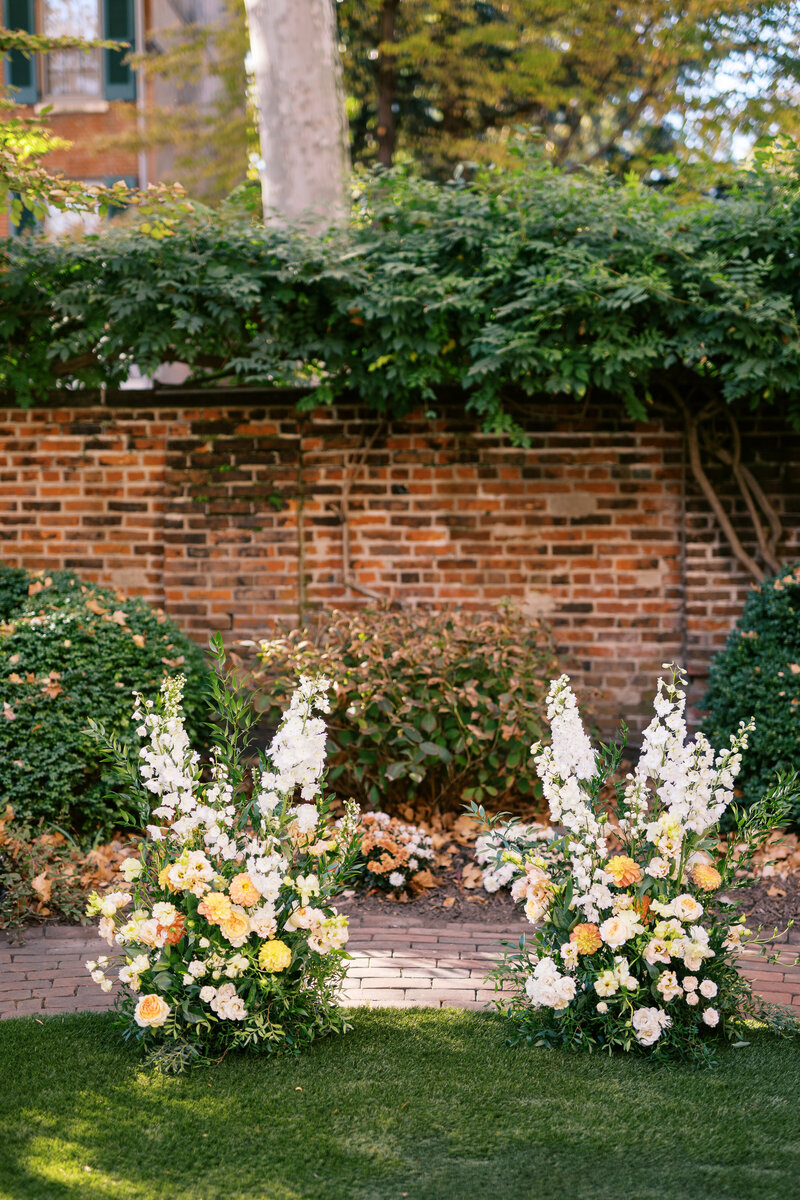 Chuppah with bright florals at Glen Foerd Estate in Philadelphia, PA
