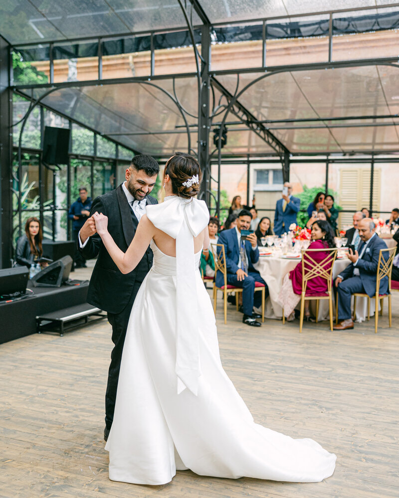 Bride and groom dancing in Lake Como