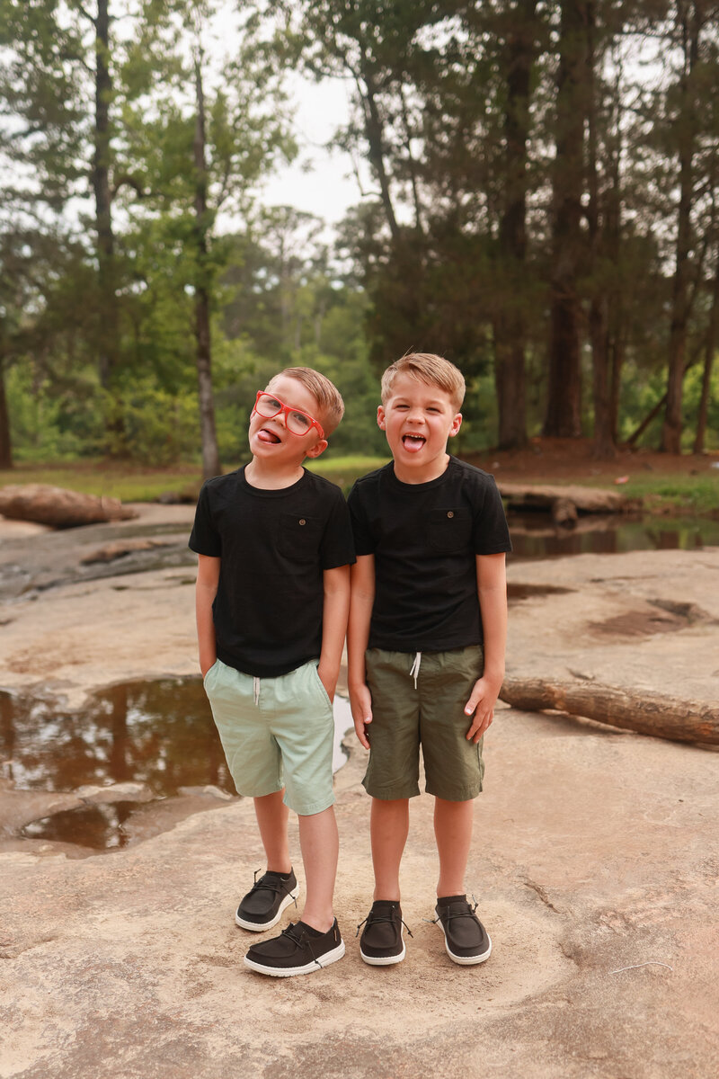 little boys smiling at camera at park in Columbus Georgia 