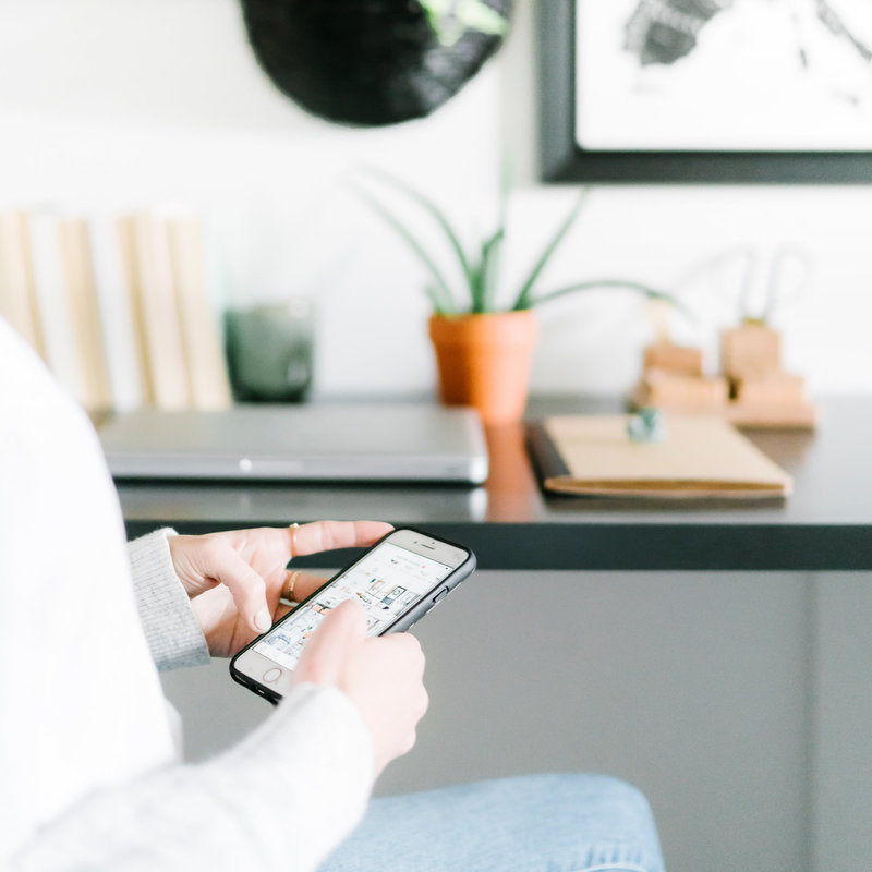 Woman using iphone