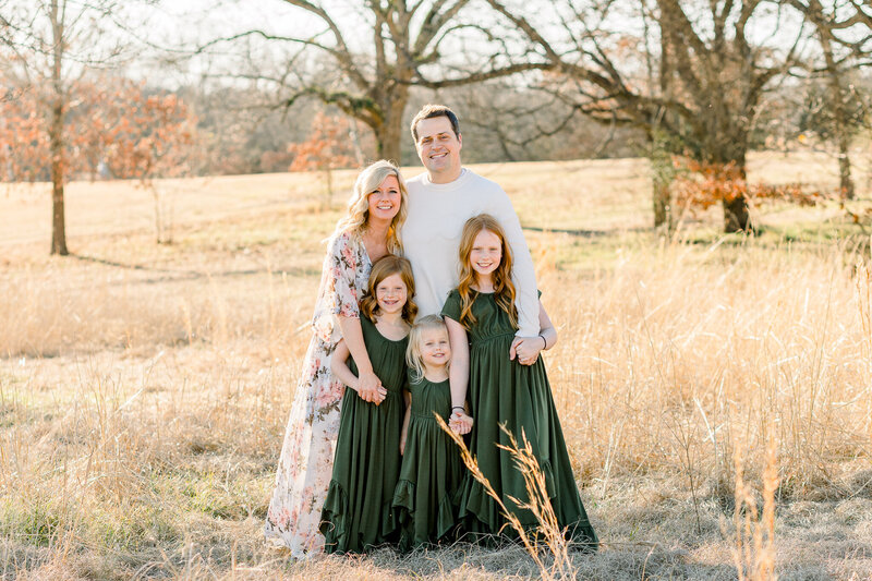 CJ and Olive Photography's family session in an outdoor field setting at golden hour. Brandon, MS newborn photographer.