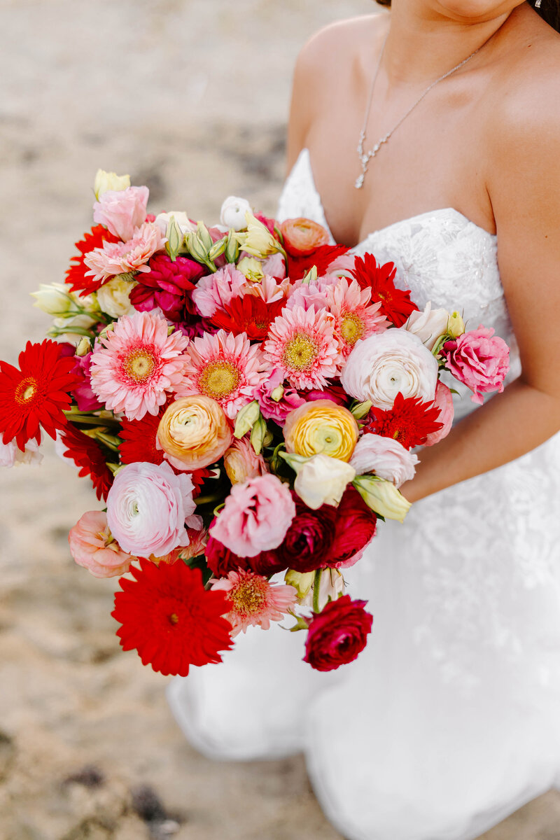 bridal colorful pink, orange, red, green wedding day bouqet.