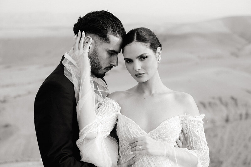 Bride and groom during sunset in Agafay Desert