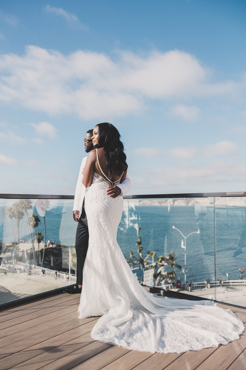 bride and groom share an intimate moment wedding at wedgewood weddings la jolla cove in la jolla ca