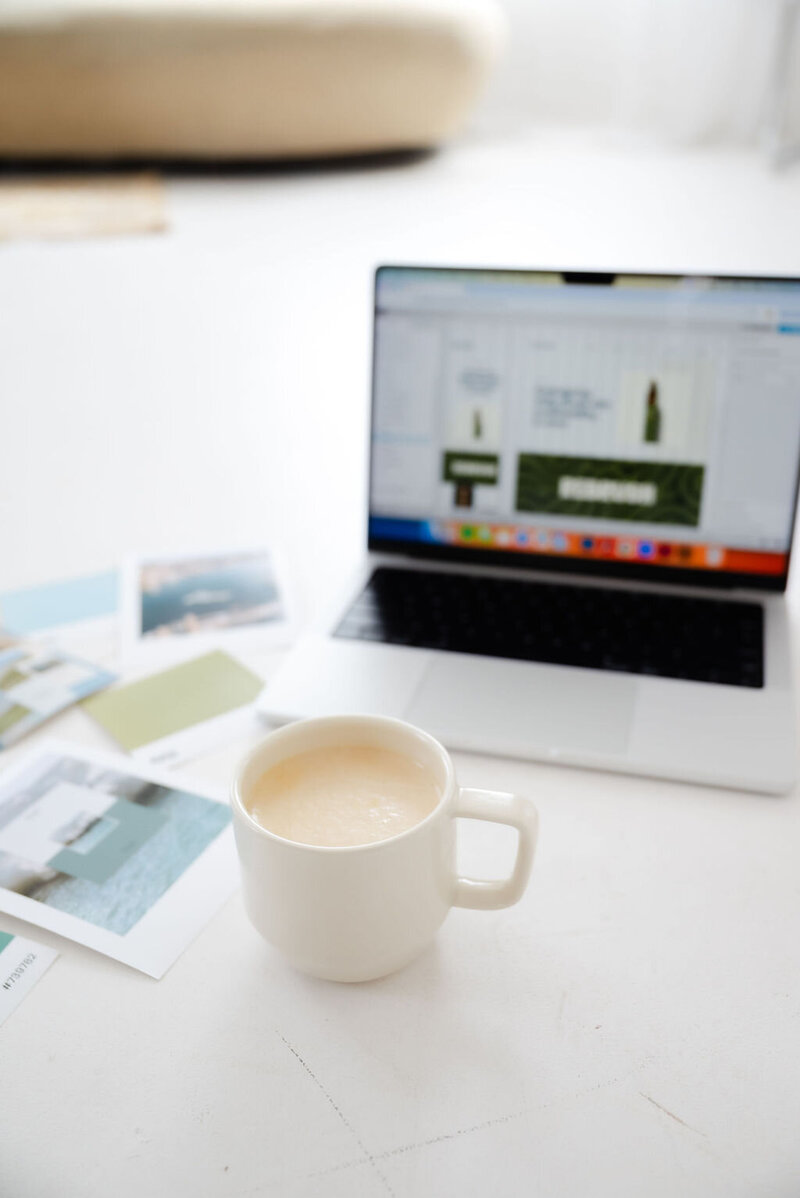 Image showing a designer working on branding and Showit web design for small businesses