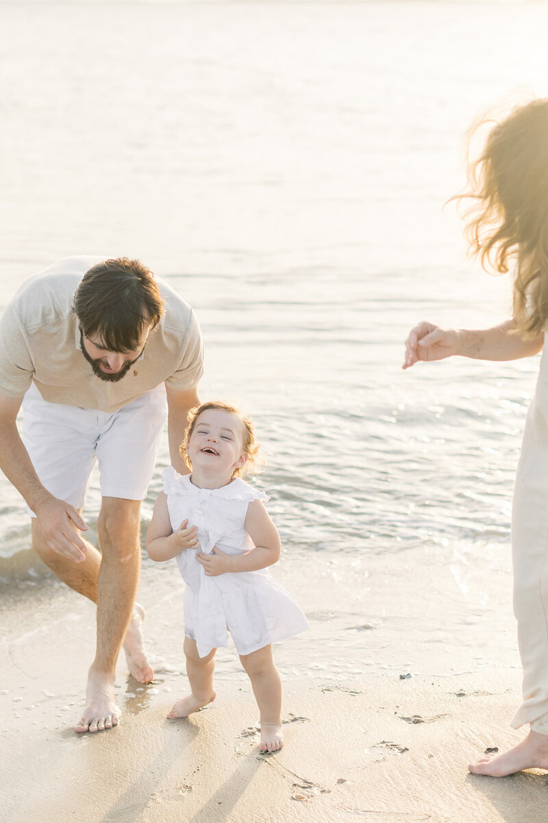 South Carolina photographer | Family laughing together at the beach