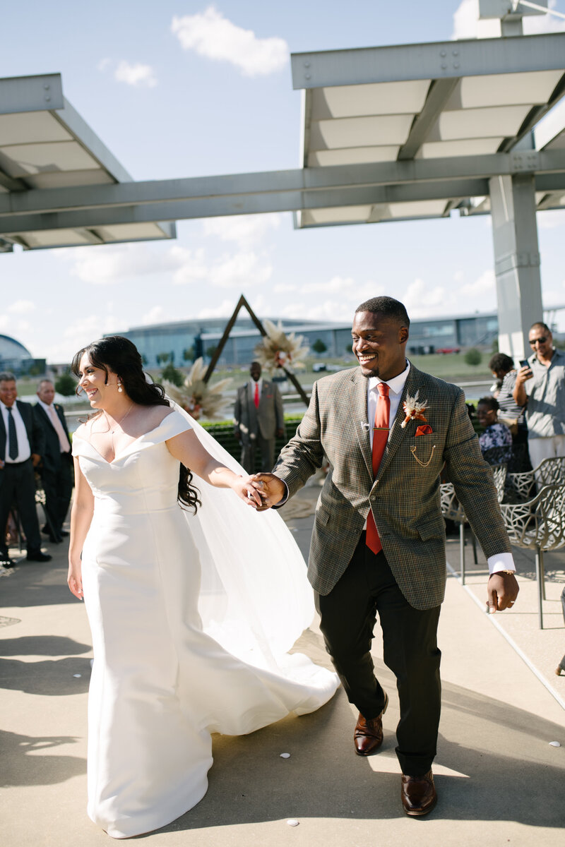 A candid and documentary style image of a couple during their wedding reception in a austin texas wedding venue