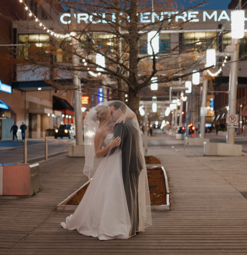 bride resting her head on her groom's shoulder