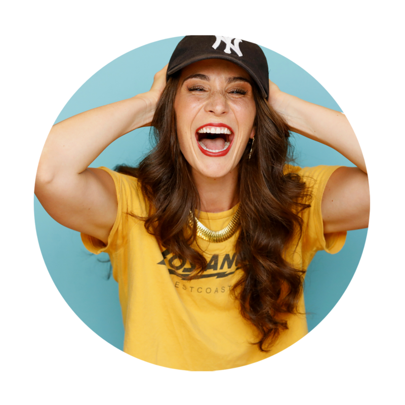 Actress laughing with baseball cap