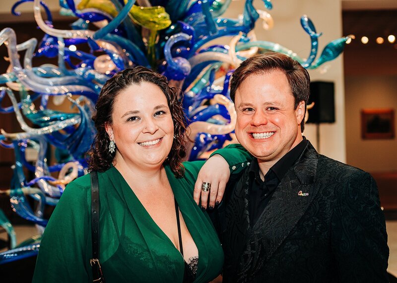 Orlando Museum Birthday party couple hugging  and smiling