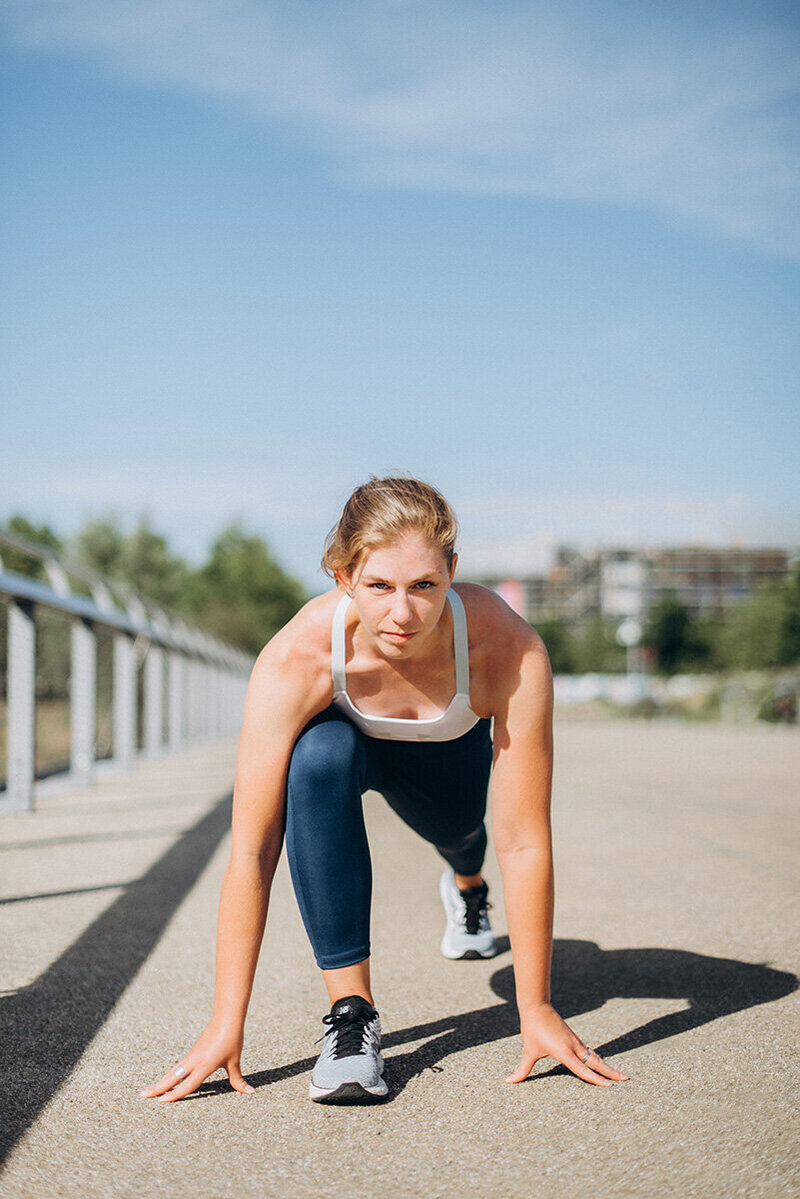 Train With Ellen warm up exercise outdoors.