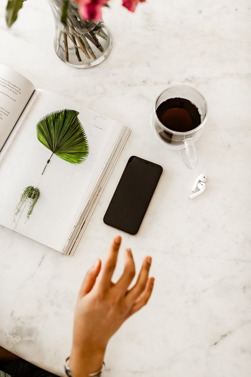 image of book coffee iphone and airpods