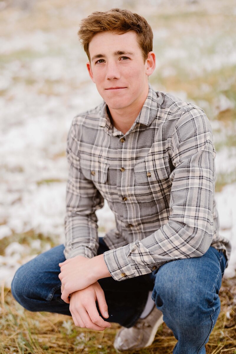 Graduating high school senior has an outdoor Fort Collins, Colorado senior photo session with senior photographer Avenir Photo Co.