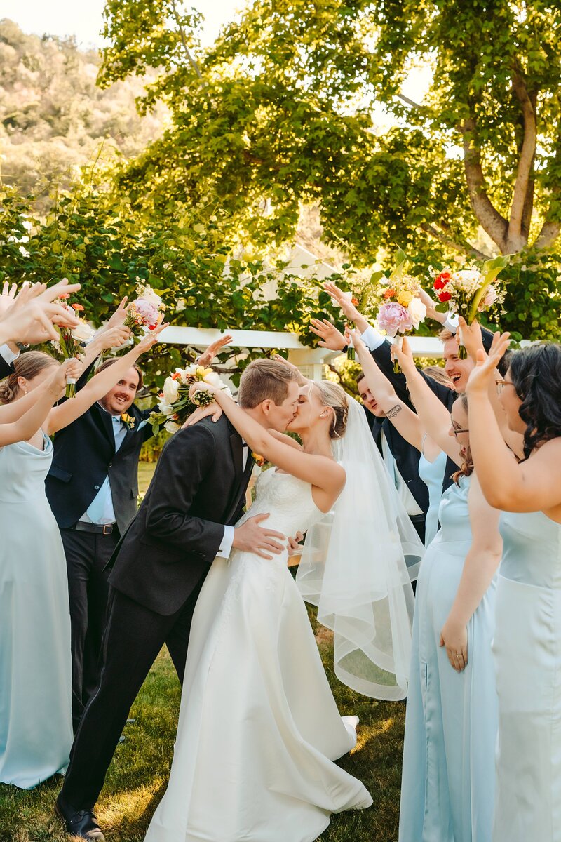 Groom Newlyweds Taking a Stroll | Photography  by Jocelyn