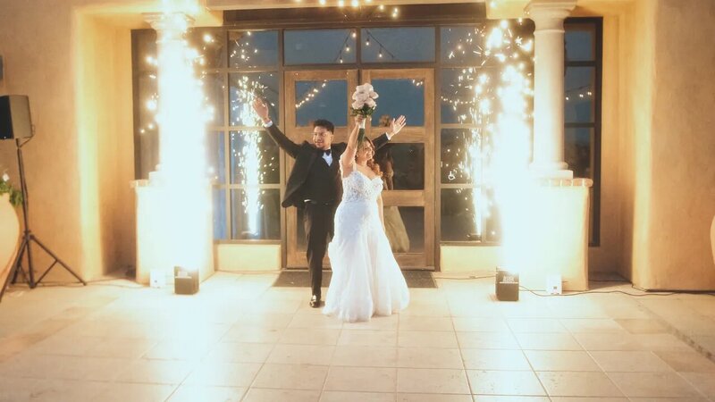 Hispanic-groom-white-bride-grand-entrance-to-reception-with-sparklers