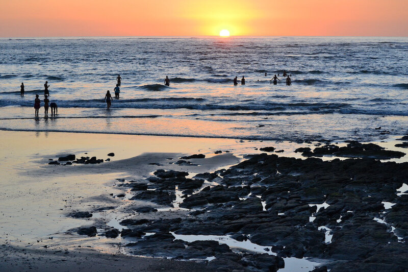 evening beach swimmers blue spirit costa rica