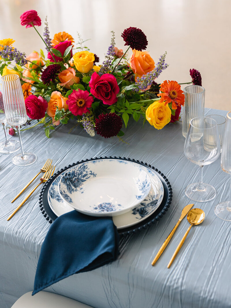 bright colorful head table floral design