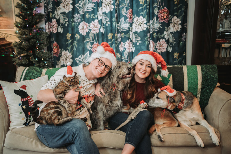 Eric and his family including his wife, 2 dogs, a cat, and a bearded dragon.