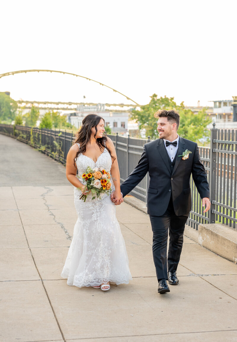 Pittsburgh couple walking outside Sheraton Station Square 