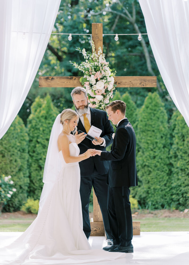 bride and groom praying together during wedding