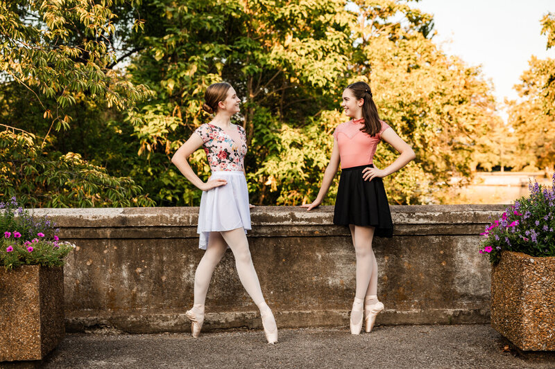 Two dancers in a classy pose outdoors