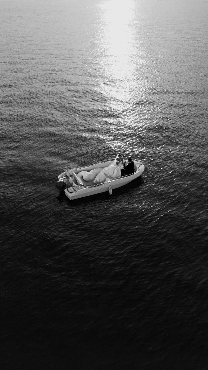 wedding-couple-portrait-boat-drone-blackwhite-laurianevega
