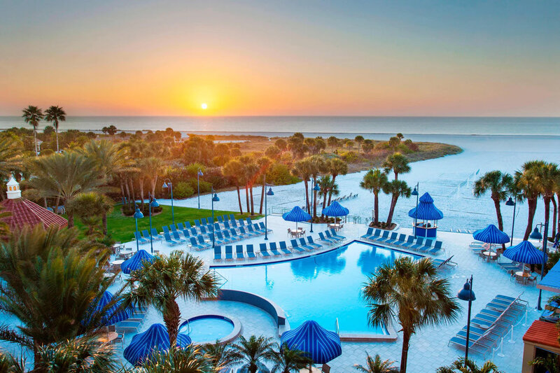 host hotel for retreat view of pool and clearwater beach