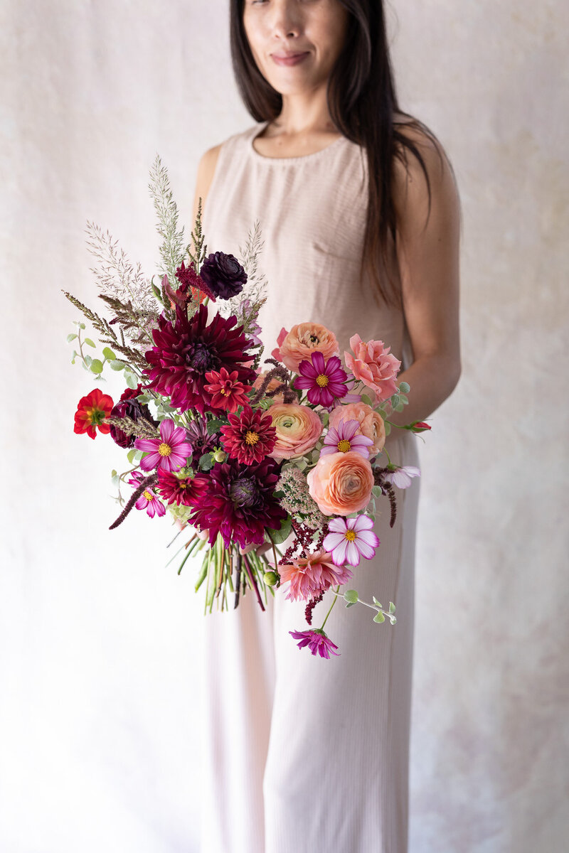 Wedding. bouquet with Rananculus, Anemomes, Peonies