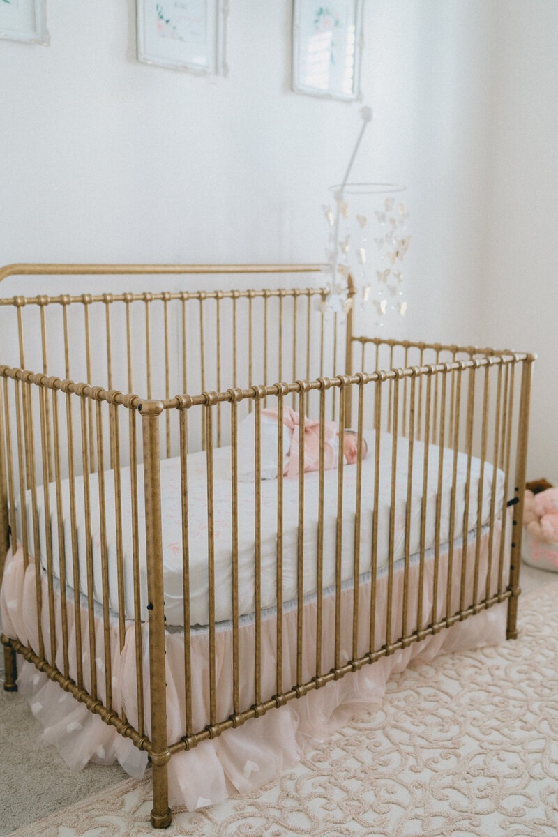 baby in the crib nursery photos