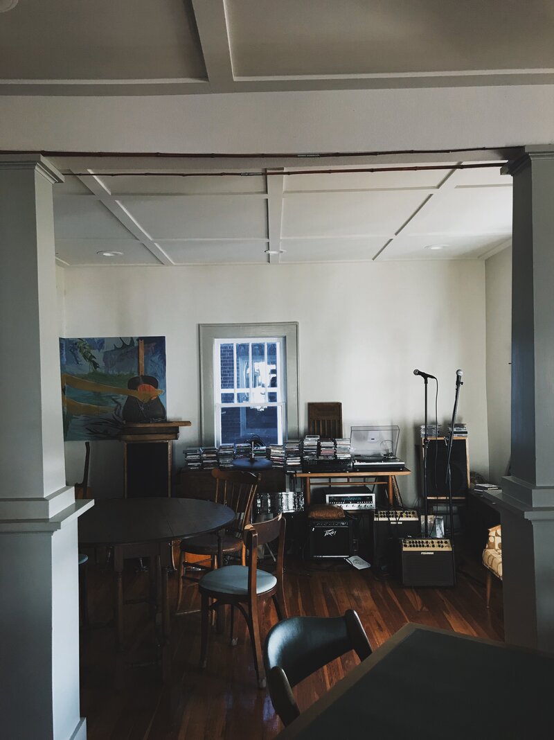 CD's, microphones, tables, and chairs in Hillcrest's Music Space
