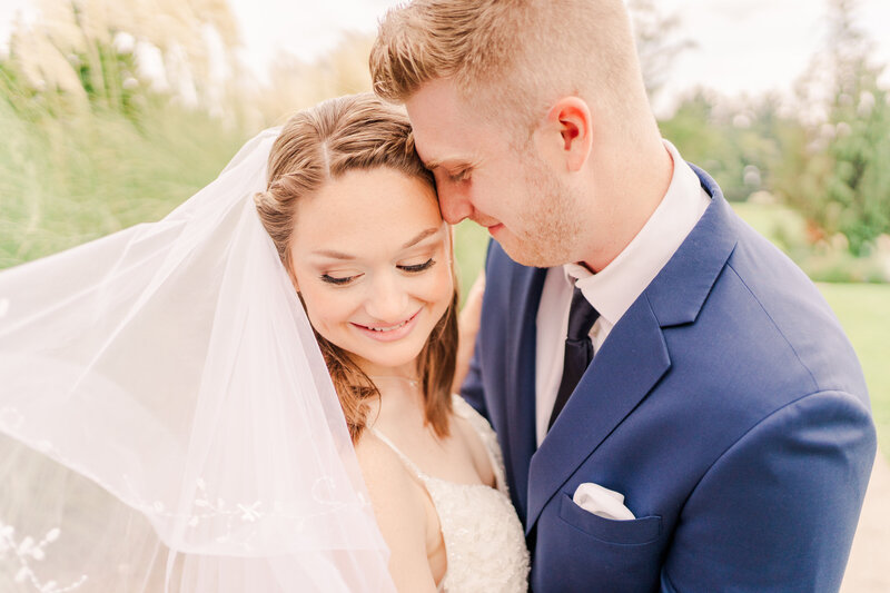 close up wedding photo of bride and groom by Joni Loraine Photography