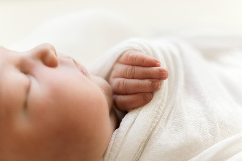 Macro image of newborn hand during an in-home Philadelphia Newborn Session