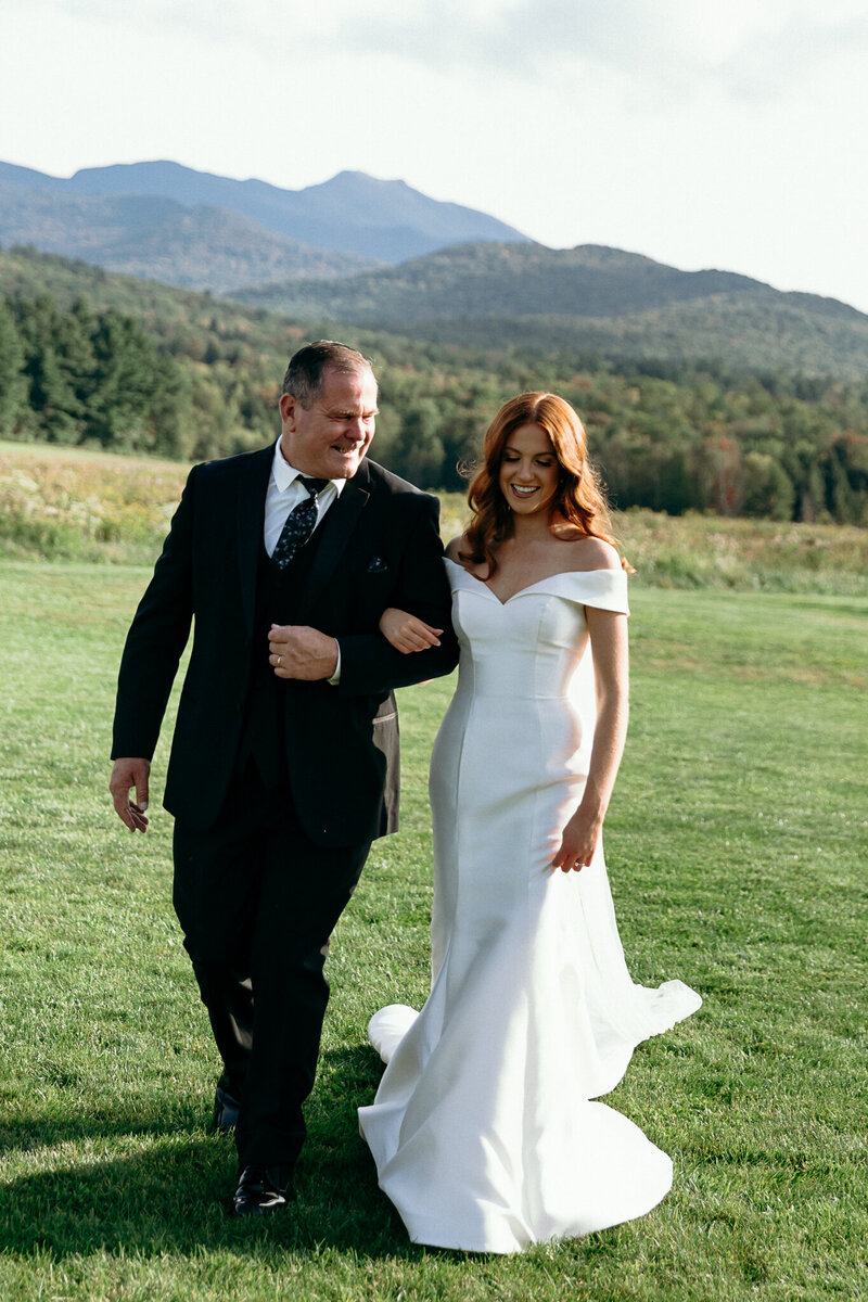 Vermont Wedding Photographer | Sincerely Liz Photography Documentary Wedding, Engagement, Elopement, Maternity and Newborn Photographer in New England | Bride and groom walking side by side at the mountains