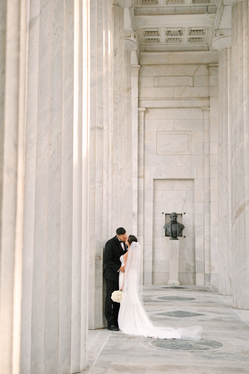 bride and groom holding each other