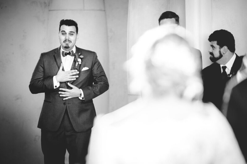 Groom sees his bride for the first time at the ceremony