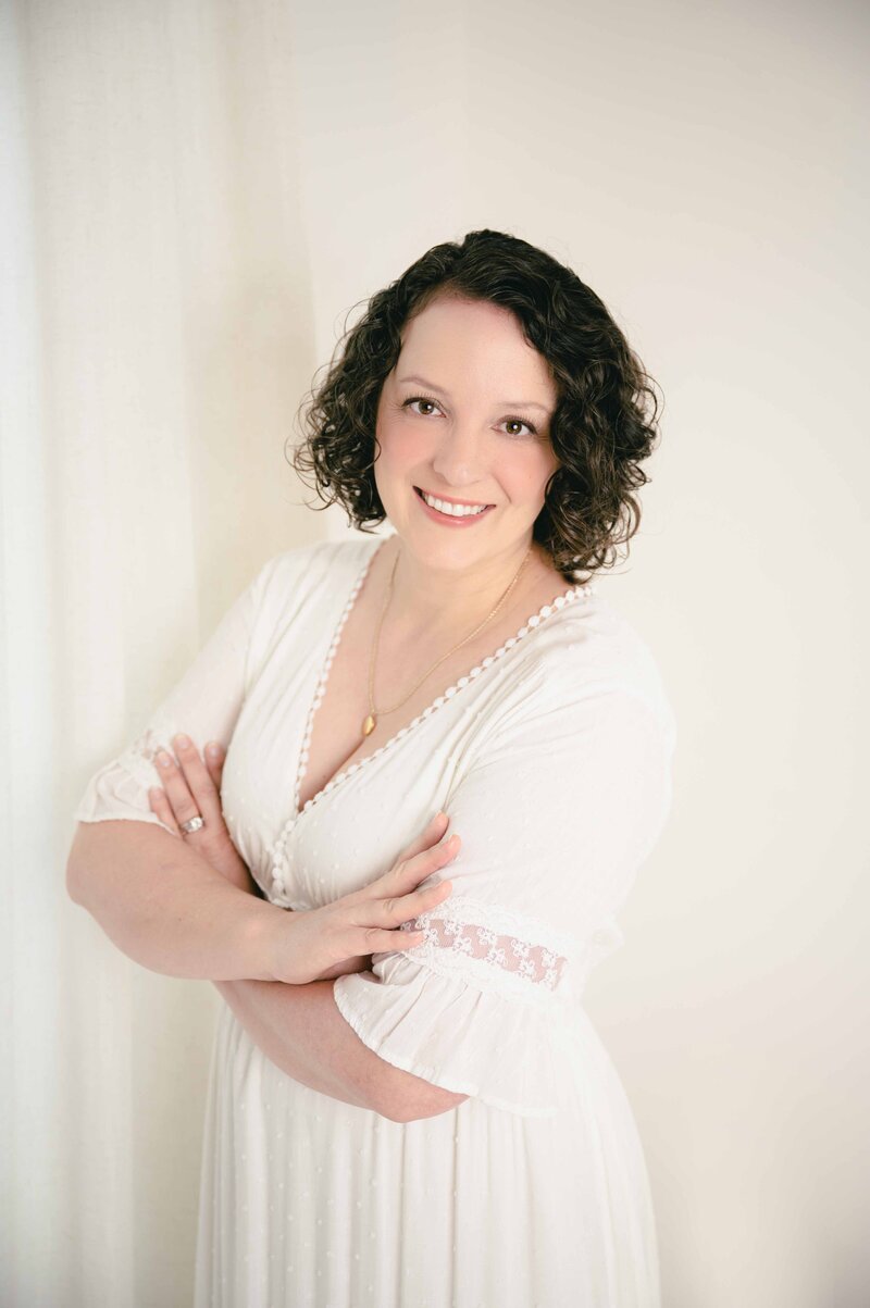 Winston-Salem photographer Emily Richardson holding her child