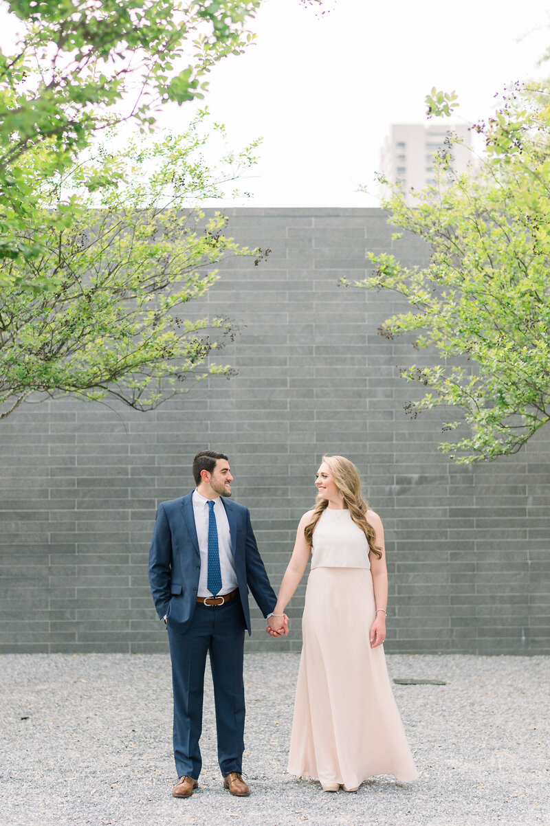 Bride and groom walk up memorial steps at their DC wedding